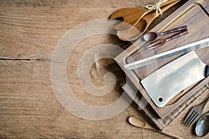 Wooden utensil in kitchen on old wooden background