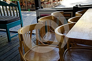 Wooden Vintage chairs in cafe, modern cozy interior