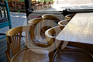 Wooden Vintage chairs in cafe, modern cozy interior