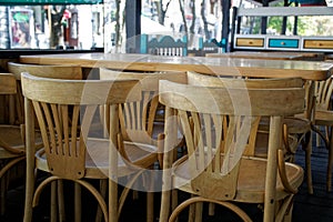 Wooden Vintage chairs in cafe, modern cozy interior