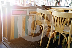 Wooden Vintage chairs in cafe, modern cozy interior