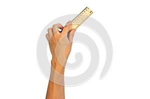 Wooden vintage ruler with asian boy hand isolated on white background for math measurement concept. Old classic vintage wooden