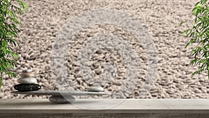 Wooden vintage table or shelf with stone balance, over blurred carpet fur close-up, feng shui, zen concept architecture interior