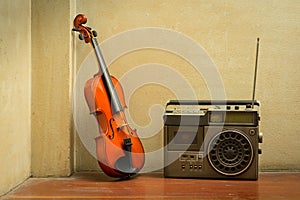 Wooden violin with old style radio