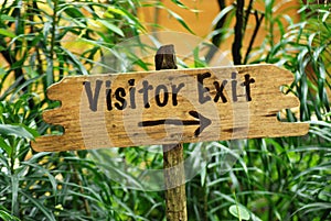 Wooden visitor exit sign board