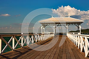 Wooden walking path leading to seacoast