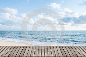 Wooden walkway with beautiful white sand beach ocean and clear blue sky background