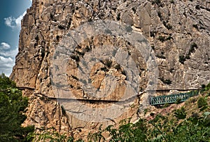 wooden walkway to walk along the mountain and avoid falls