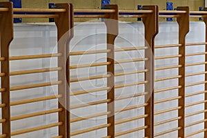 wooden wall bars to perform physical exercises inside the school