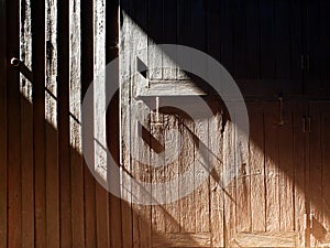 Wooden wall, light and shadow