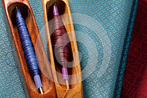 Wooden weaving shuttle for silk textile production