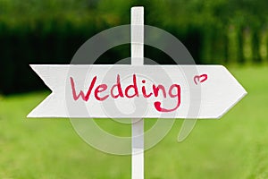 Wooden wedding arrow sign