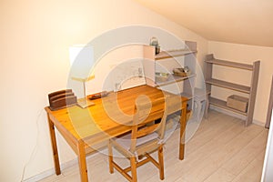 Wooden well arranged desk prepared to work