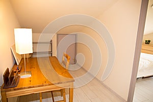 Wooden well arranged desk prepared to work