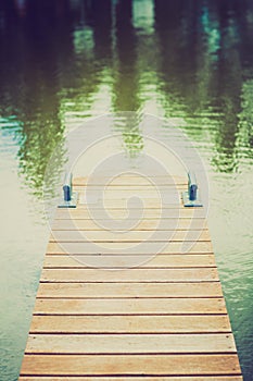 Wooden wharf and blue water