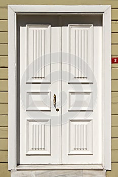 Wooden white front door