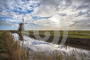 Wooden windmill in a Dutch polder