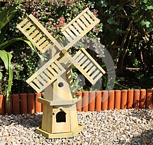 Wooden Windmill Garden Ornament.