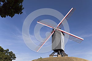 Wooden windmill on the hill in Bruges
