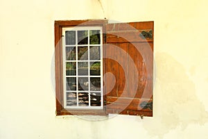 The wooden window of a 200 year old farmhouse in the Western Cape, South Africa