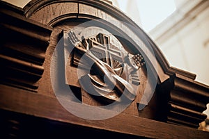 Wooden window of confessional box at church