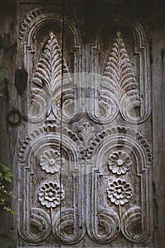 Wooden window platband with beautiful ornament