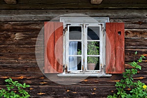 Wooden window with shutters Lithuania