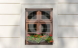 Wooden window on white house