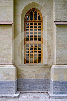 Wooden Windows of the temple in the Gothic style. Temple in the deep forest. Travel in nature, adventure