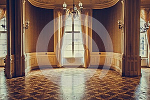 Wooden windows with vintage curtains and square moldings on a sunny day. beige satin curtains. interior of an empty room with