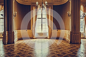 Wooden windows with vintage curtains and square moldings on a sunny day. beige satin curtains. interior of an empty room with photo