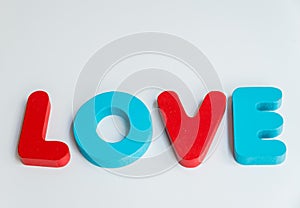 Wooden word LOVE on White background
