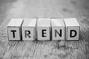 Wooden word on wooden table background concept  - Trend