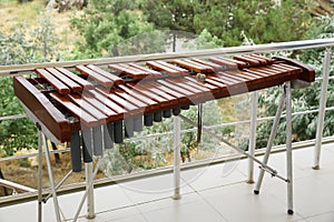 Xylophone, weenote. Xylophone closeup, wooden percussion instrument green backgrounds .Thai wooden alto xylophone instrument.