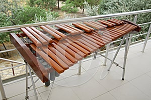 Xylophone, weenote. Xylophone closeup, wooden percussion instrument green backgrounds .Thai wooden alto xylophone instrument.