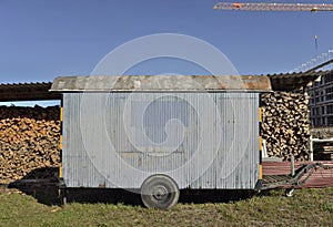 Woodfire and trailer at swiss farm in Bern.