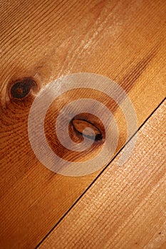 Woods seeing eyes close up abstract texture plate of pine wood with a branch eye knot hole background brown yellow wooden stock