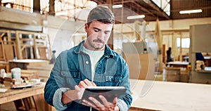 Woodwork, carpenter and man with tablet in workshop for research or planning on app. Technology, timber or professional