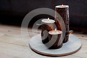 Woodwork project making three rustic wooden tea light candle holders