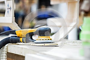 Woodwork tool is a sanding machine in a carpentry workshop