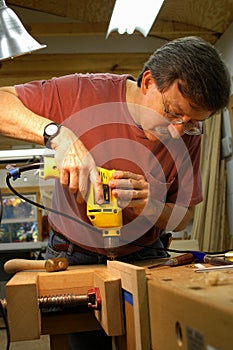 Woodworker with Drill