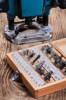 woodworking tools - roundover router bits in wooden box and plunge pouter