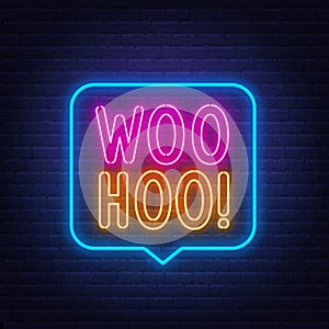 Woohoo neon neon sign in the speech bubble on brick wall background
