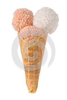 Wool pom poms on ice cream waffle cone