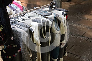 Wool pullovers hand work street sale photo