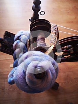 Wool spinning on old school spinningwheel