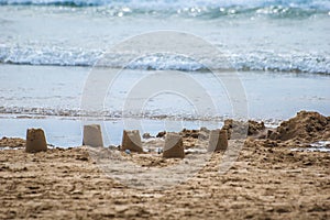 WOOLACOMBE, DEVON, ENGLAND - 21 June 2021: Sandcastles on Woolacombe beach in Devon, England