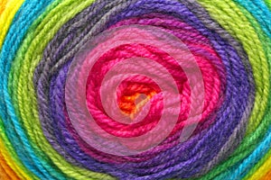 Woolen threads wrapped around each other to form a target with t