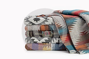 Woolen throw blanket in Pendelton style. Concept for a good christmas present, studio shot.