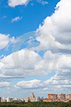 Woolpack clouds over urban district